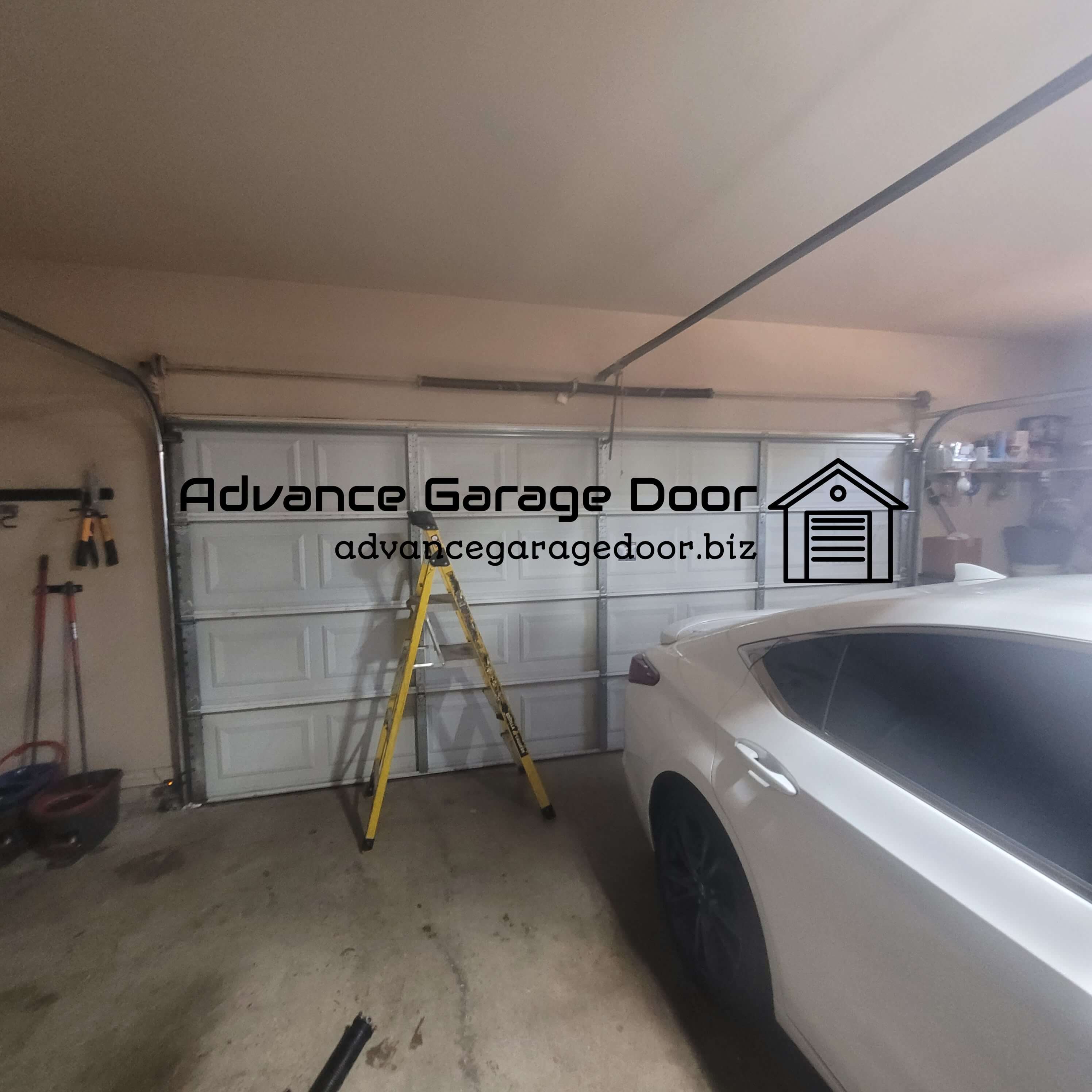 advancegaragedoor.biz_garage_door_spring_repair